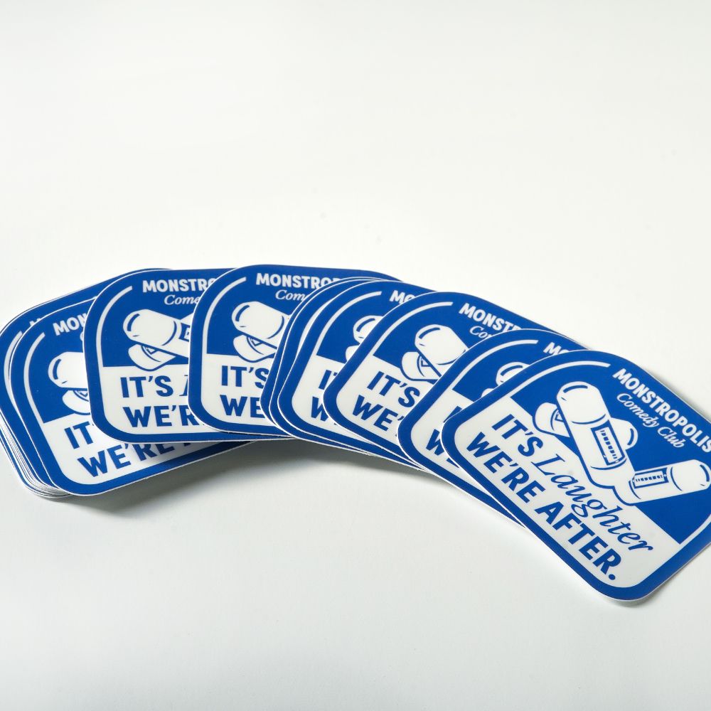 Monstropolis Comedy Club Disney-inspired sticker with phrase ‘It’s Laughter We’re After’ and three laugh canisters.