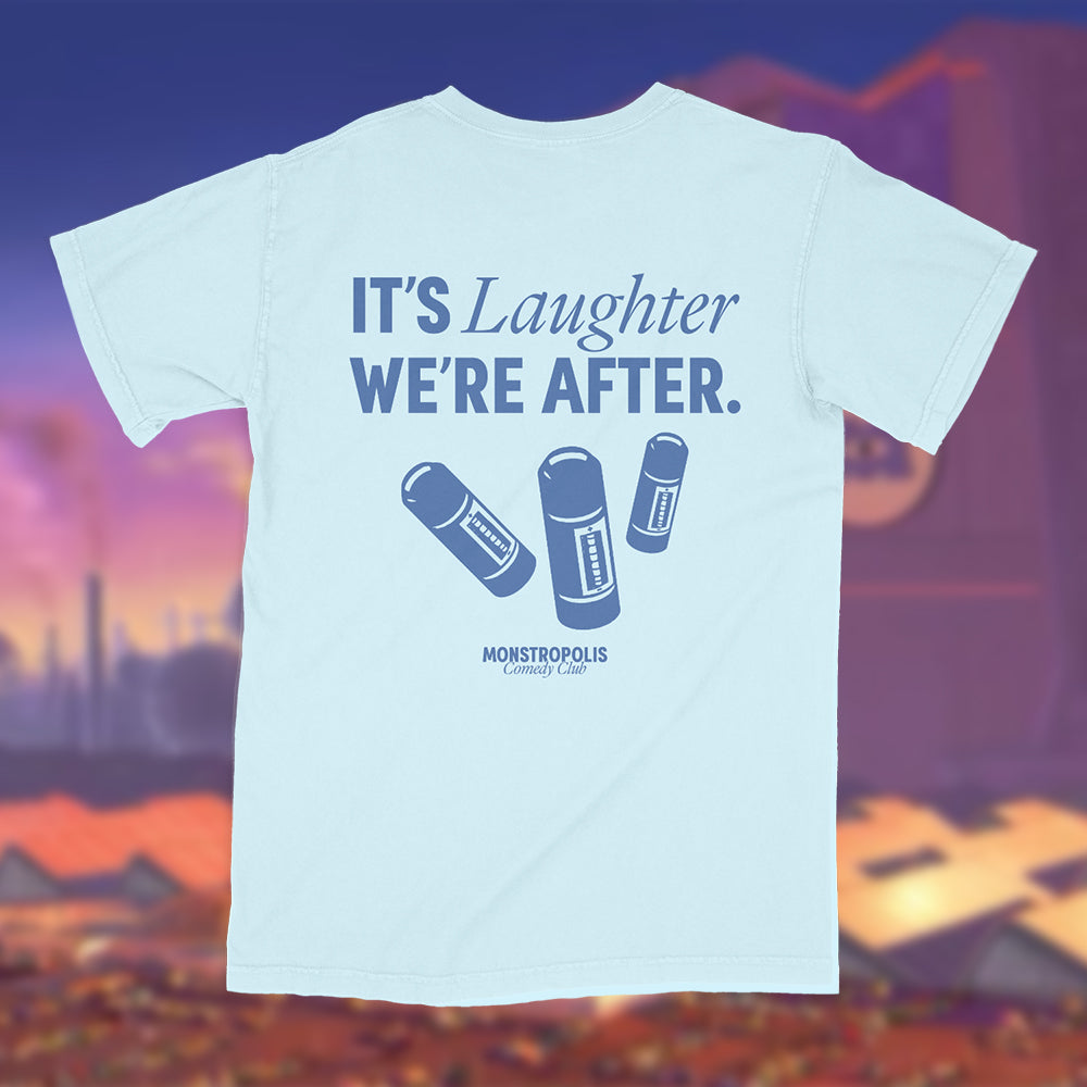 Back view of a Disney-inspired Monstropolis Comedy Club t-shirt featuring the phrase ‘It’s Laughter We’re After’ above three laugh canisters with small Monstropolis Comedy Club text underneath.
