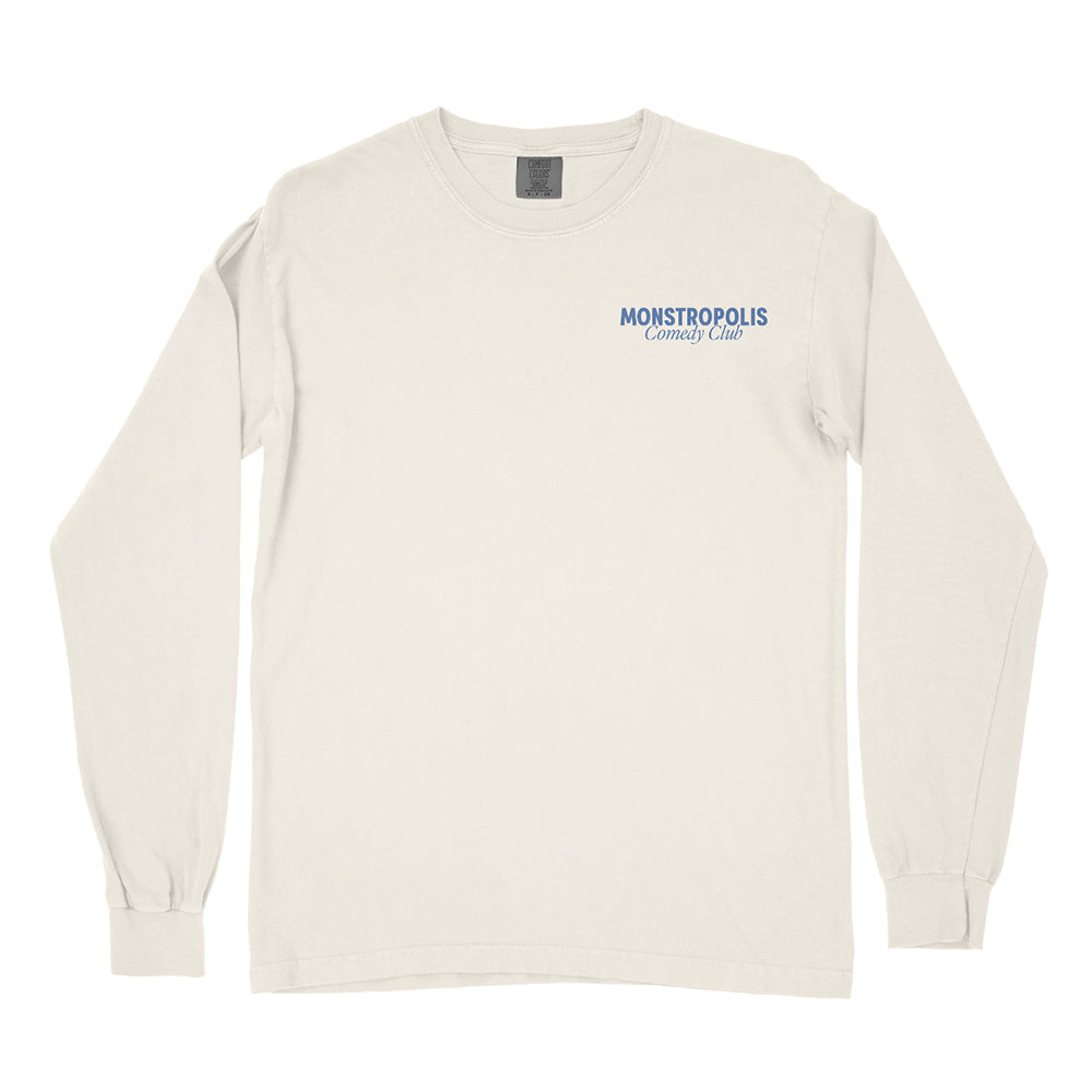 Front view of Disney-inspired Monstropolis Comedy Club long sleeve t-shirt with small left chest logo text reading Monstropolis Comedy Club.